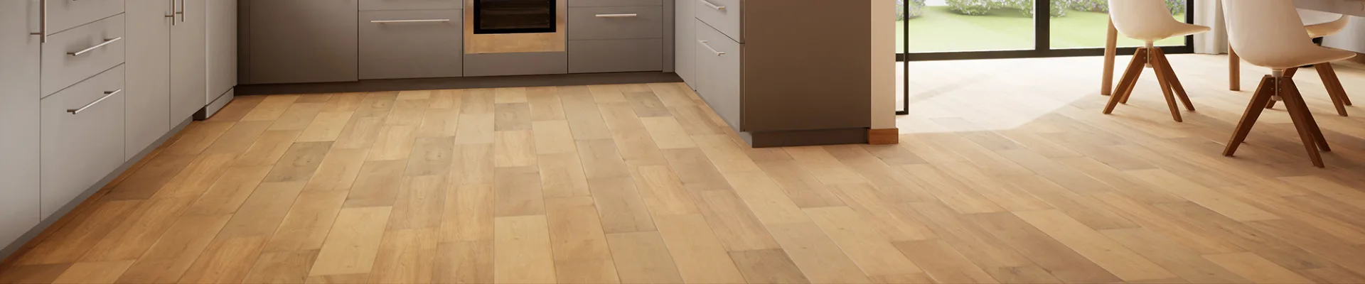 hardwood floors in modern kitchen with grey cabinets